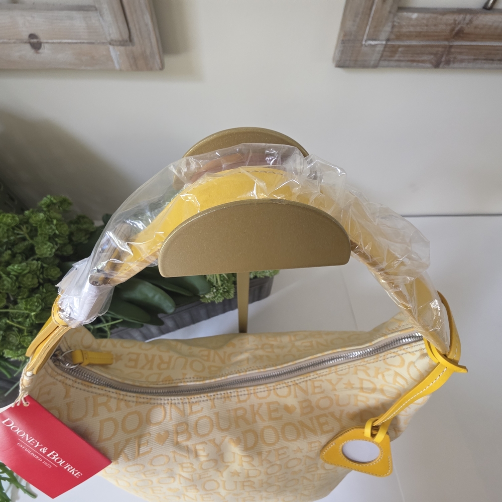 Dooney & Bourke Large Bucket Bag Sunflower Logo Canvas Leather Trim- New - Picture 10 of 16